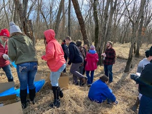 Lemonweir students tap maple trees.