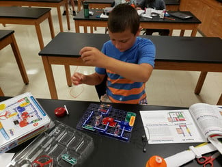 Student working with circuits