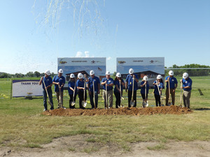 Confetti shoots into the air with after groundbreaking