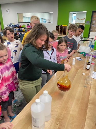 Students from iLEAD demonstrated science experiments for E1 Montessori students.