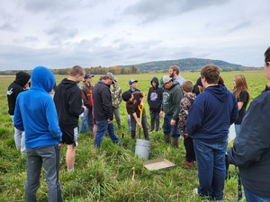 Lemonweir Academy students about soil health with local partners.