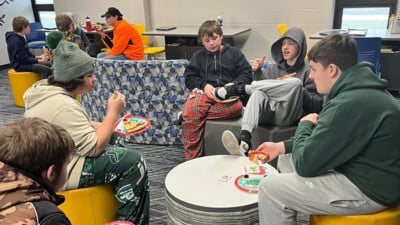 Students enjoying treats during the last day before Winter Break.