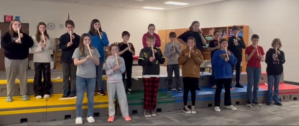 Grayside students are playing their recorders.