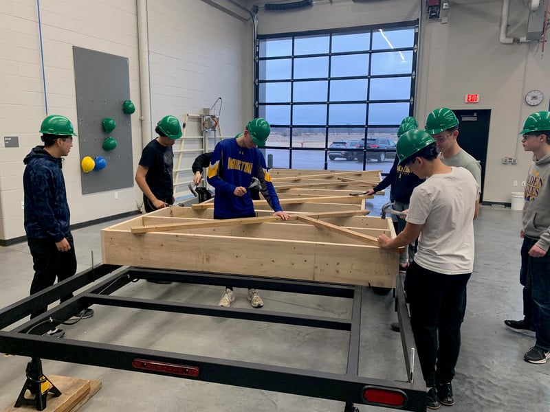 Juniors and Seniors working on the Tiny House.