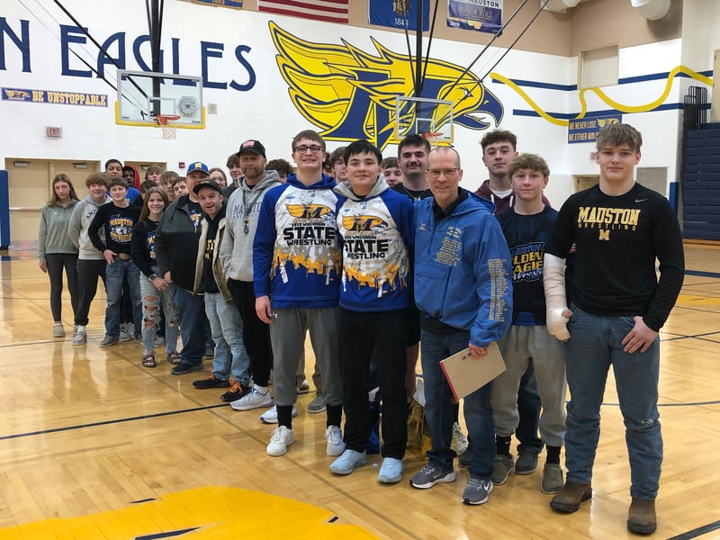 Members of the Wrestling Team going to state assemble during a state send off at MHS.
