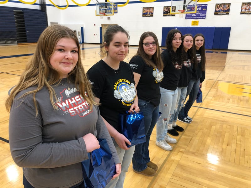 Powerlifting Team going to state assemble during a state send off at MHS.