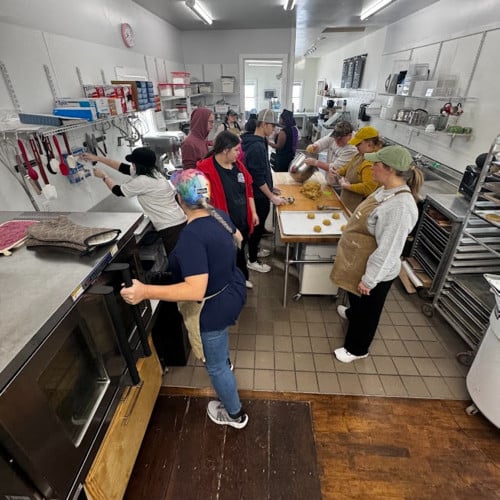 iLEAD students in an industrial kitchen.
