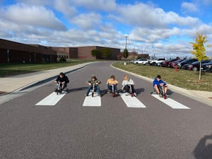 Students race their robotic creations.