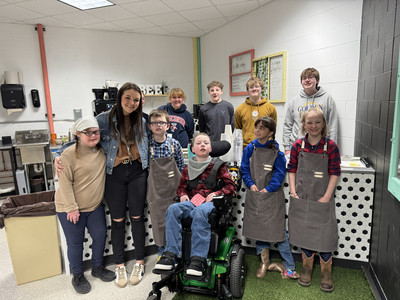 Wheelie Bean students pose for a photo at the Reality Fair Expo.