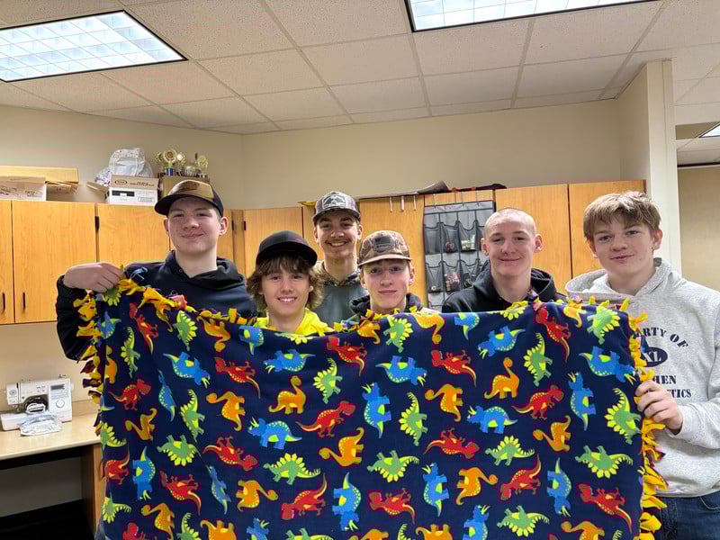 Mauston FFA and NHS made tie blankets to donate throughout the community.
