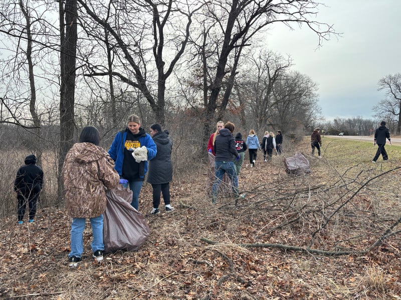 Mauston FFA and NHS pick up garbage, and improved local walking trails at Outdoors Forever.
