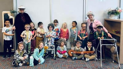 Students and staff dressed as elderly people to celebrate the 100th day of school.